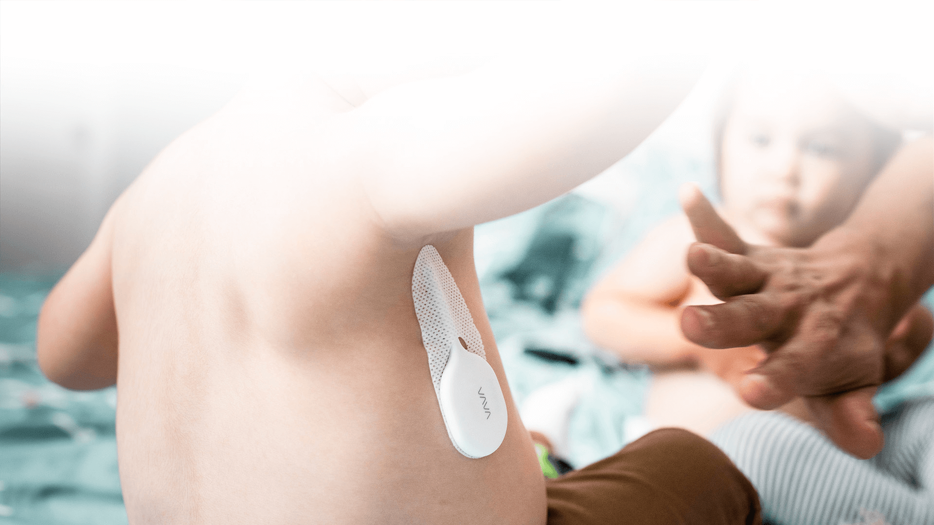 Child wearing a VAVA smart thermometer