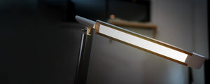 View of a black VAVA desk lamp’s light