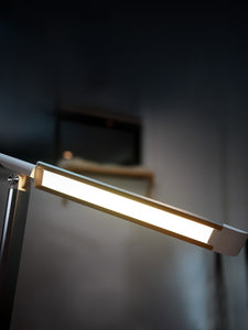 View of a black VAVA desk lamp’s light