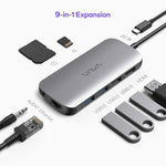 VAVA 9-in-1 USB-C Hub in the middle of Ethernet, Audio, 2 USB 3.0, USB 2.0, HDMI, DC In, TF, and SD cards and cables